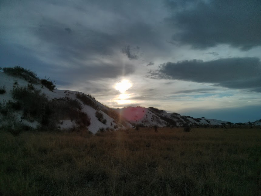 Out the other side of my truck, giant sand dunes that just spring out of nowhere