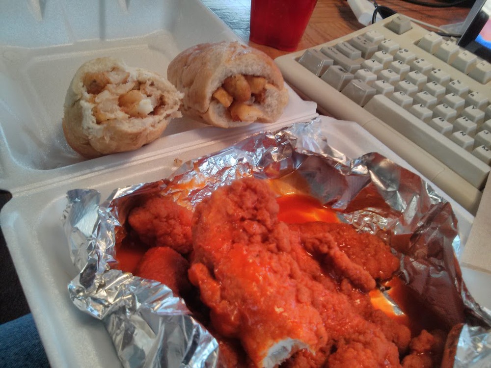 That's buffalo chicken strips (they were out of wings), with a side of mozzarella sticks and fried jalapenos wrapped in rolls