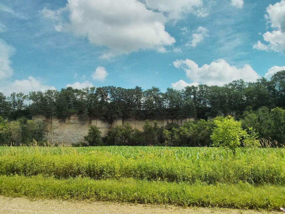 This odd cliff is on the road leading up to the farm. I have no idea how it formed, but it's pretty neat.